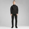 Puma Muški donji deo trenerke Evostripe Core, Crne
