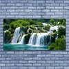 tulup.si Slika na akrilnem steklu Slap narava 140x70 cm 4 obešalnika