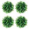 Vidaxl Umetni pušpani okrogli z LED lučmi 4 kosi zelene 15 cm