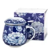 Porcelanasta skodelica z motivom rože in infuzerjem 10,5x12,5x9