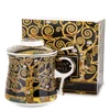 Porcelanasta skodelica za čaj z infuzerjem z motivom Gustava Klimta