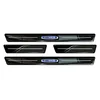 Door sill trims Volvo XC60 2017- (dark, glossy)