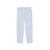 LACOSTE Hlače pastelno modra