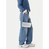 Torbica Tommy Jeans srebrna barva, AW0AW18009