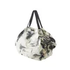 Shupatto Nakupovalna torba Packable Bag 27L off-bela