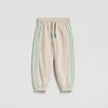 Reserved - Sportske pantalone sa bočnom linijom