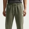 Nike M NK CLUB VARSITY JOGGER, muške hlače, zelena IO1376