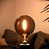 Müller Licht tint white LED globus E27 4,9 W zlata - zlato - Steklo