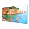 tulup.si Slika na steklu Morje landscape rocks 125x50 cm 4 obešalnika