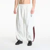 Hlače adidas x Willy Chavarria Woven Track Pant Off White XL