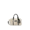 LANCASTER Paris Ročna torbica Lancaster Sac polochon Zippé S Moumoute Ecru - Noir bež