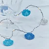 Sirius LED-lučke Selma Clam, modre, 20-flg., delujejo na baterije - Dnevna soba/jedilnica - Mladostno bivanje - modra - Plastika