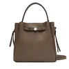 Usnjena torbica Tory Burch Romy Bucket