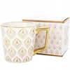 Elegantna porcelanasta skodelica z zlatim ročajem 310 ml, idealna za darilo