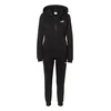 Puma Ženska trenerka Hooded Sweat Suit Full-Zip FL CL, Crna