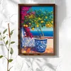 WallXpert uramljena MDF slika NAL114-70, limunovo drvo u plavo-beloj saksiji na terasi iznad mora, 50 x 70 cm