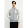 TOMMY HILFIGER Prehodna jakna VARSITY kremna / pegasto siva / bela