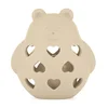 PETITE&MARS Igrača silikonska z ropotuljico Bear Basil Desert Sand 0m+