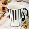 Šolja sa poklopcem Piano, 250 ml