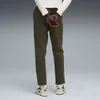 Puma Evostripe DK pantalone za muškarce, maslinaste bo?e