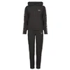Emporio Armani EA7 TRAIN TRACKSUIT W HO RN CH EXTENDED LOGO BR - TRAIN TRACKSUIT W Črna
