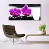 tulup.si Slika na steklu Orhideje narava 140x70 cm 4 obešalnika