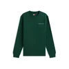 Tommy Jeans Majica LINEAR smaragd / bela