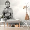 Tapeta črno-bel Buda v položaju za meditacijo - 294x270