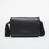 Torbica za okrog pasu Calvin Klein Emblem Aop Coated Small Flap Mes LV04D3396G Črna