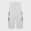 Cropp - Pantalone s printom - light grey