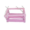 Roze drvena ljuljaška za decu sa stranicama 40x25 cm