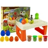 slomart LEAN TOYS Leseni stolček s plastelinom, dinozavri in utekočinjen vulkan