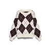 VERO MODA Pulover slonovina/pegasto črna