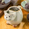 Skodelica mačka z žepom za čajno vrečko
