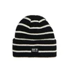 Cropp - Kapa beanie s printom - CRNO