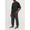 Champion Spodnji del trenirke 220415 Črna Loose Fit