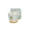 Duo Preprosta porcelanasta skodelica 600 ml - ŽENSKA Z DEŽNIKOM (Claude Monet)