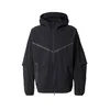 Nike Sportswear Prehodna jakna TCH siva/črna