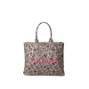 Juicy Couture Nakupovalna torba Daisy bež/rjava/roza