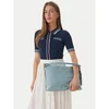 Tommy Hilfiger Ročna torba Th Statement Leather Bag Suede AW0AW18402 Svetlo modra