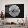 WallXpert slika na kaljenom staklu CAM12361, Deda Mraz u saonicama sa irvasima ispred punog meseca, 50 x 70 cm