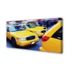 tulup.si Slika na platnu Rumeni taxi mesta 140x70 cm