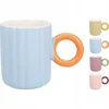 Koopman Pastelna porcelanasta skodelica z ročajem 370 ml 1 kos.