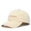 Tommy Hilfiger Kapa s šiltom Tjm Script AM0AM14455 Kremna