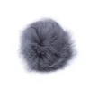 Kožuhovinasti pompom z zanko O6 cm - sivo-modra