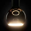 SEGULA LED globusna svetilka Plavajoča, E27 črna G125 4 W 922 dim - črna, zlata - Steklo
