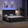 vidaXL Otomanski posteljni okvir z vzmetnicami črn 180x200 cm blago