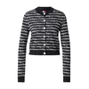 Tommy Jeans Jopa na zadrgo črna/bela