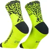 Nogavice Dynafit RUN WILD MID SK, ultra rumene (EU 35-38)