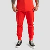 GymBeam Muška trenerka Limitless Hot Red